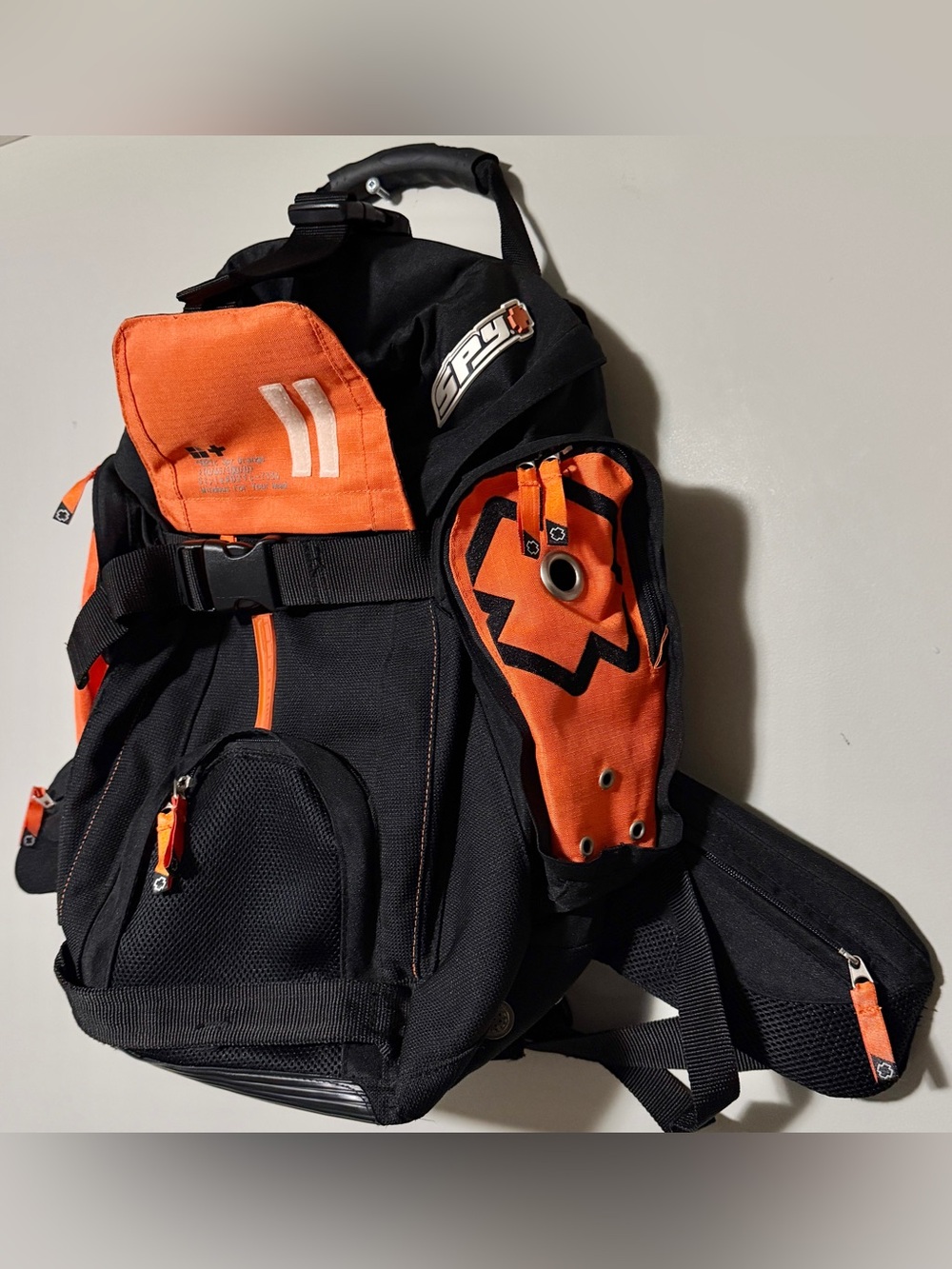 Y2K Spy snowboard / skateboard orange/black backpack